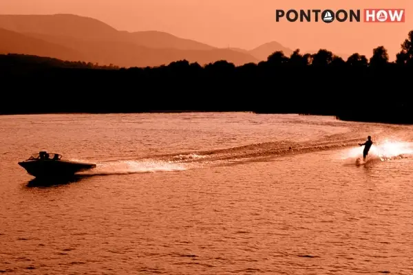 A boat is towing two skiers at the same time. How long should the tow lines be?